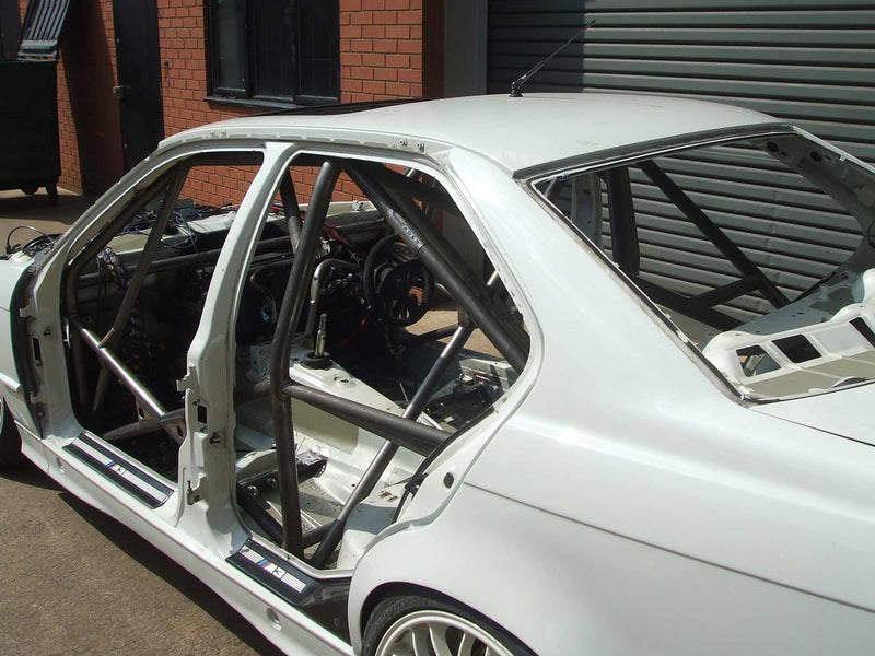 Carica immagine in Galleria Viewer, Roll Bar Multipunto Custom Cages V2 da Saldare per BMW E36 Berlina, incl. M3 - FIA