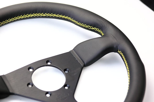 Volante Personal Grinta (330 mm), Pelle Nera, Razze Nere, Cuciture Gialle