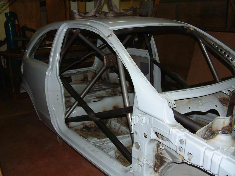 Carica immagine in Galleria Viewer, Roll Bar Multipunto Custom Cages da Saldare per Opel Corsa C - FIA (T45)
