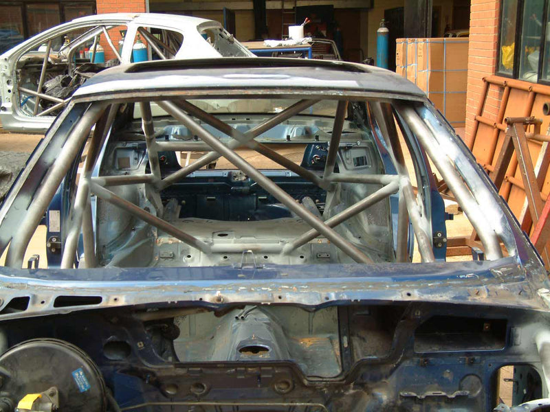 Carica immagine in Galleria Viewer, Roll Bar Multipunto Custom Cages da Saldare per BMW E36 Berlina, incl. M3 - FIA
