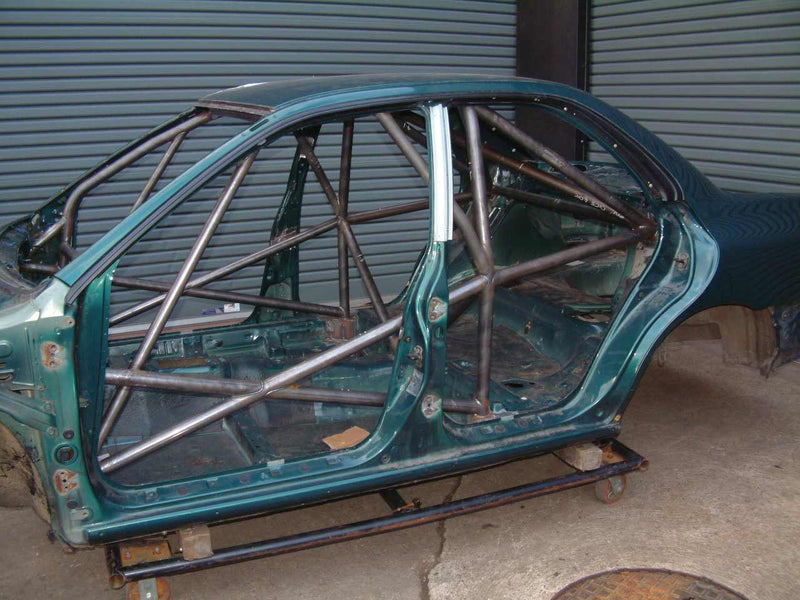 Carica immagine in Galleria Viewer, Roll Bar Multipunto Custom Cages da Saldare per Subaru Impreza GC (4 Porte) - FIA
