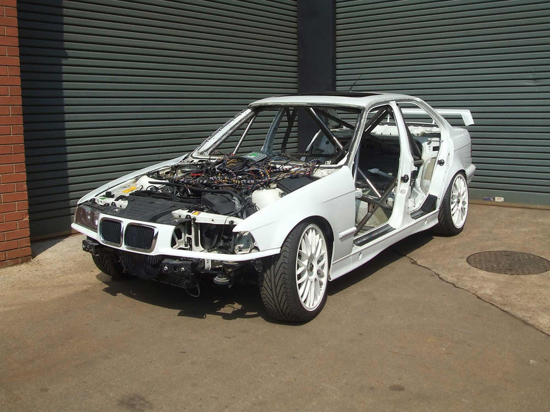 Carica immagine in Galleria Viewer, Roll Bar Multipunto Custom Cages V2 da Saldare per BMW E36 Berlina, incl. M3 - FIA
