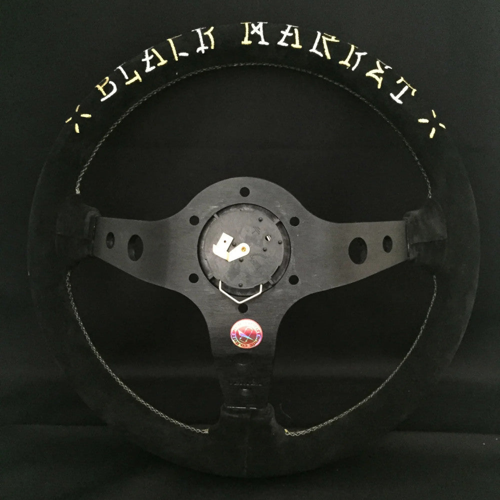 Volante Vertex Hells Racing / Oro & Argento a Calice (90 mm), Scamosciato Nero, Razze Nere - 33 cm